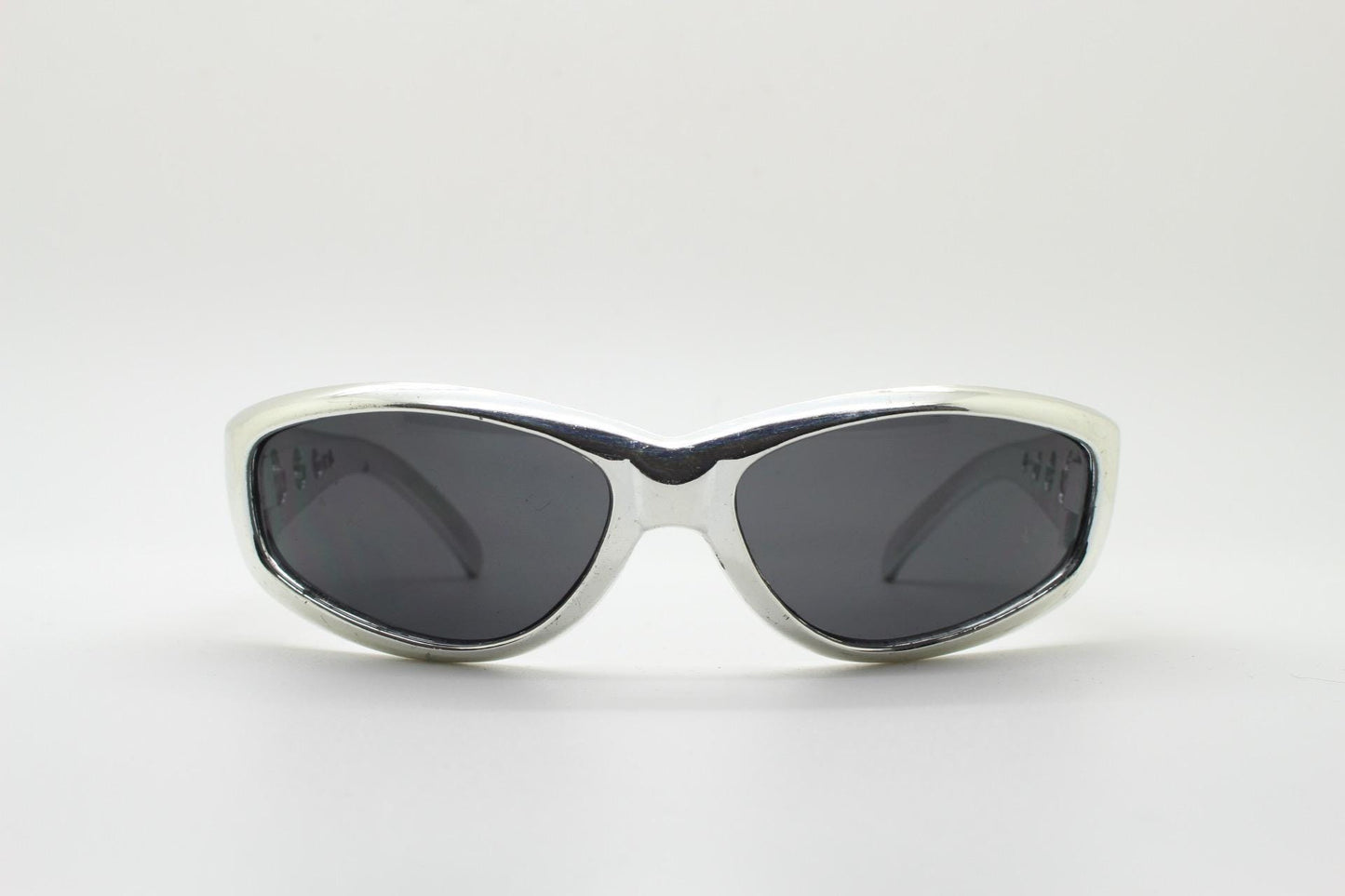 90s vintage visor sunglasses. Hyper real metallic silver superhero style mini mask sport shield with black lenses. Wrap around. NOS cosplay