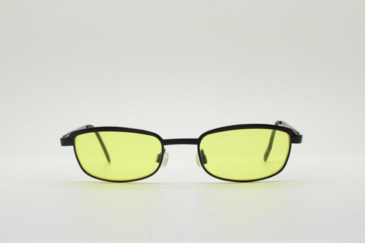 Vintage small rectangular sunglasses. Authentic quirky 90s design in a matt black solid metal frame with bright yellow lenses. 2000s. NOS
