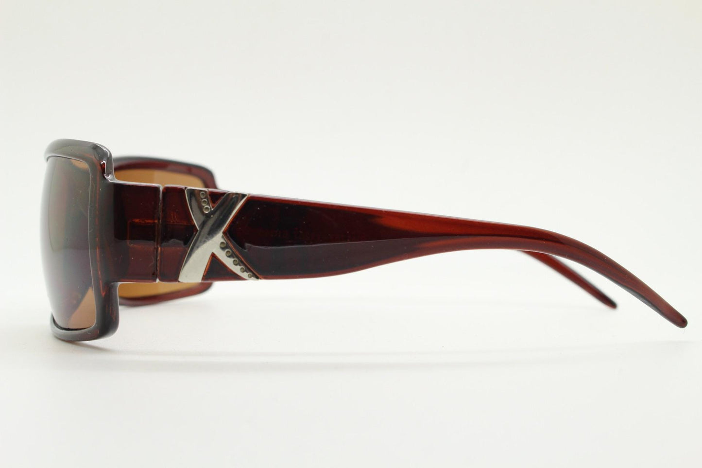 Y2K vintage visor sunglasses. Transparent brown wrap around shield with curved lenses and big X crest. 2000s biker bug eye. NOS