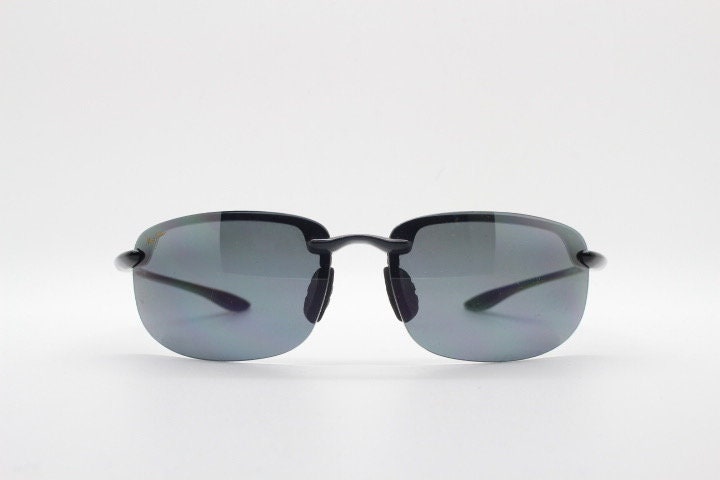 Maui Jim sport wrap around sunglasses made in Japan. Lightweight half frame shield with curving lenses. 2000's. Y2K