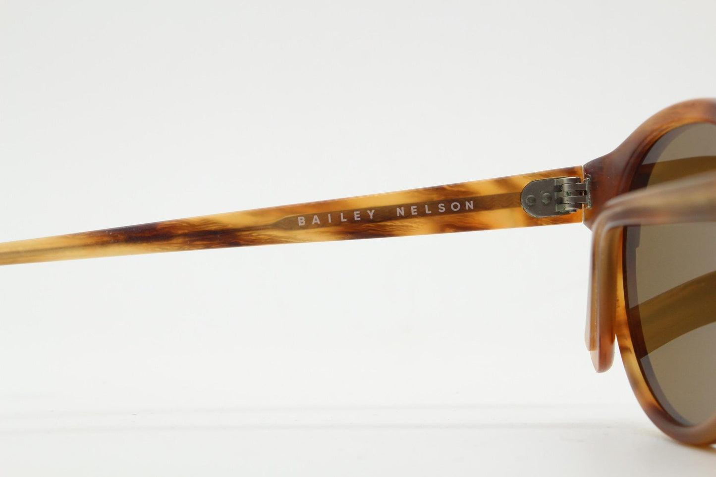 Bailey Nelson vintage hand crafted sunglasses model Gerard. Mottled honey tone acetate frame with Havana brown lenses. RRP 230