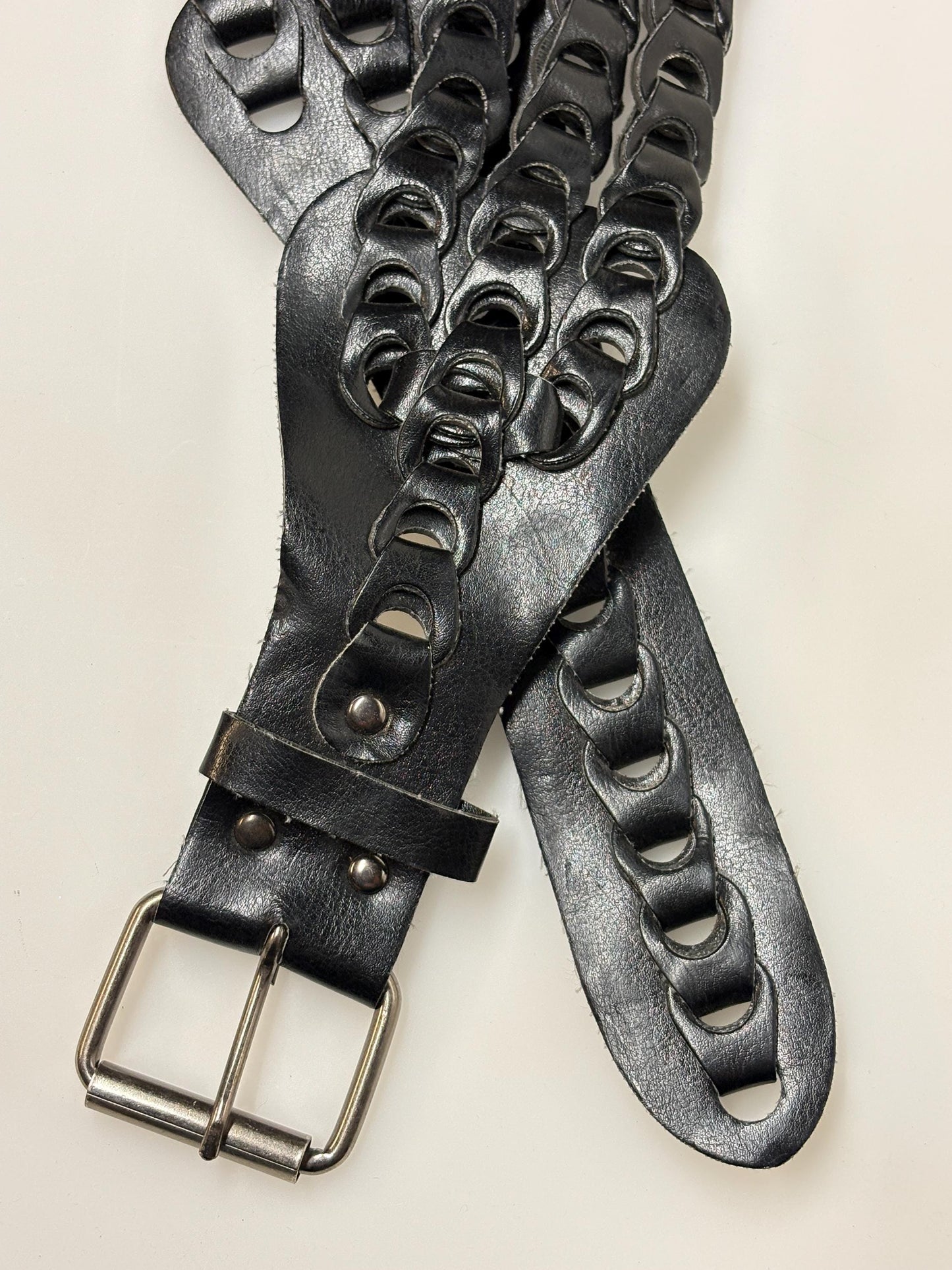 Y2K vintage tall black 70s design belt with 3 layers of looped vinyl strands and solid metal buckle. 2000s NOS. 60s hippy style. Eco leather