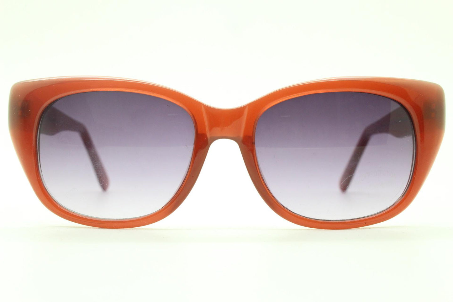 Vintage 90s rectangular cat eye sunglasses. Womens transparent brown acetate cateye in sensible proportions with graduating lenses. NOS
