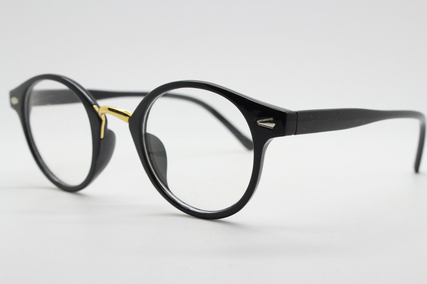 90s vintage slender frame glasses. Black with gold bridge optical frames. 40s, 50s style prescription eyeglasses. Clear lens eyeglasses. RX
