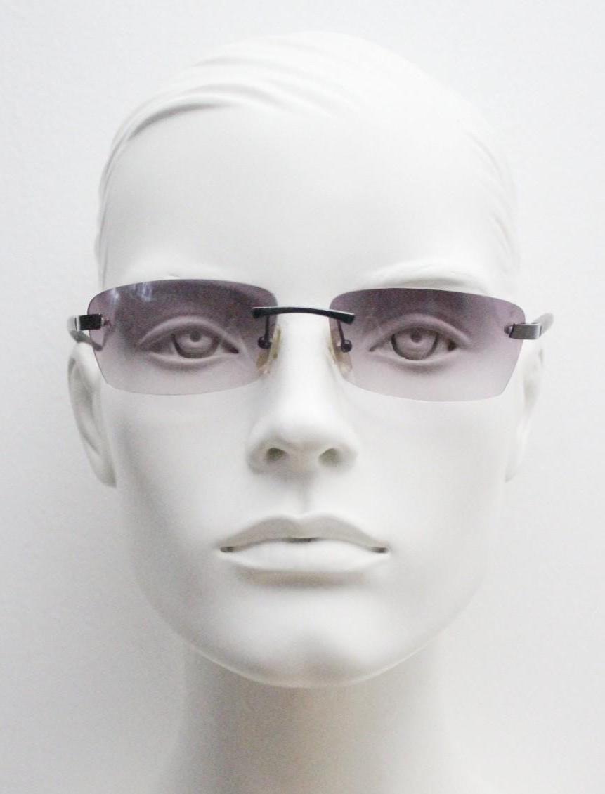 90s vintage minimal frameless sunglasses. Minimal mulberry rectangular lenses with gunmetal grey trim and frosted arms. Matrix shades
