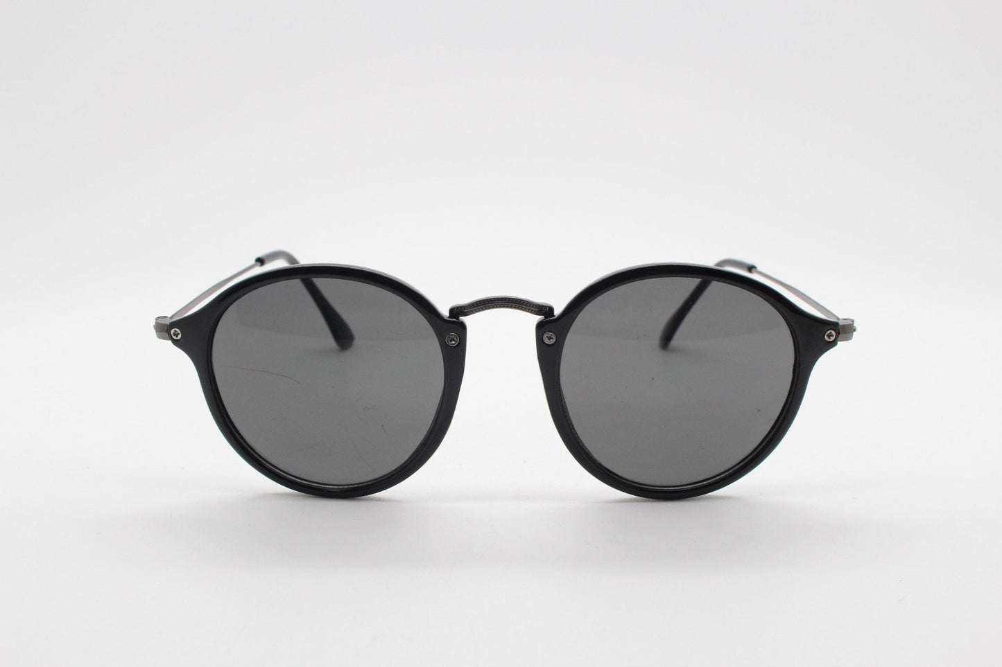 90s vintage round sunglasses. Black gloss slim 30s 40s design frame with metal bridge and dark lenses. Unused NOS