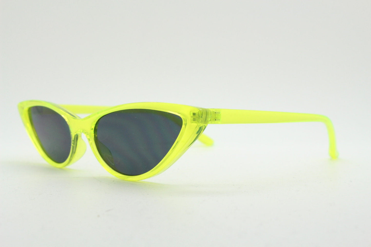 Y2K vintage extreme pointed cat eye sunglasses. Stylised yellow transparent frame with black lenses. Womens 50s style psychabilly. NOS