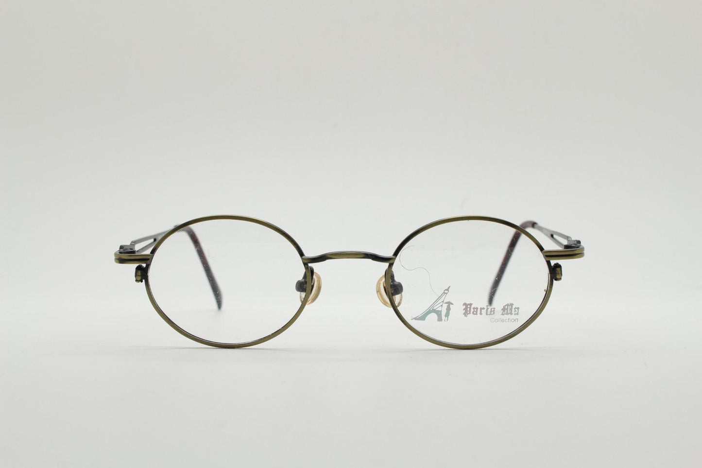 Paris Ma 90s vintage small oval eye glasses. Brushed bronze optical frames with charming details. Prescription NOS. Steampunk spectacles