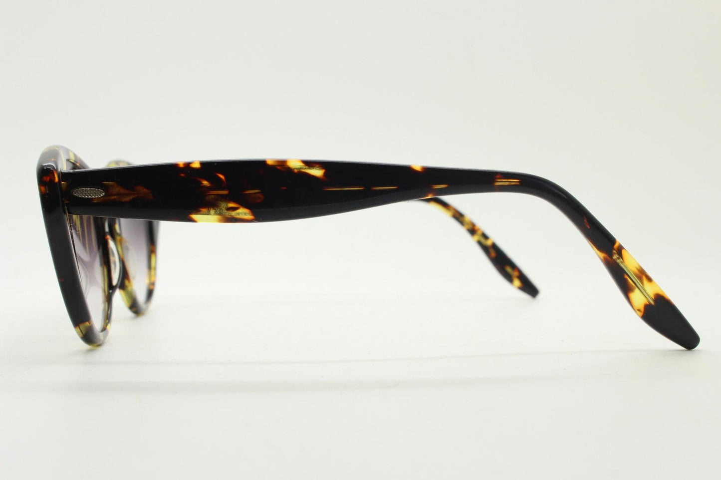 Barton Perreira subtle cat eye sunglasses model kismet. Honey tortoise acetate frame with cropped sides and graduating lenses