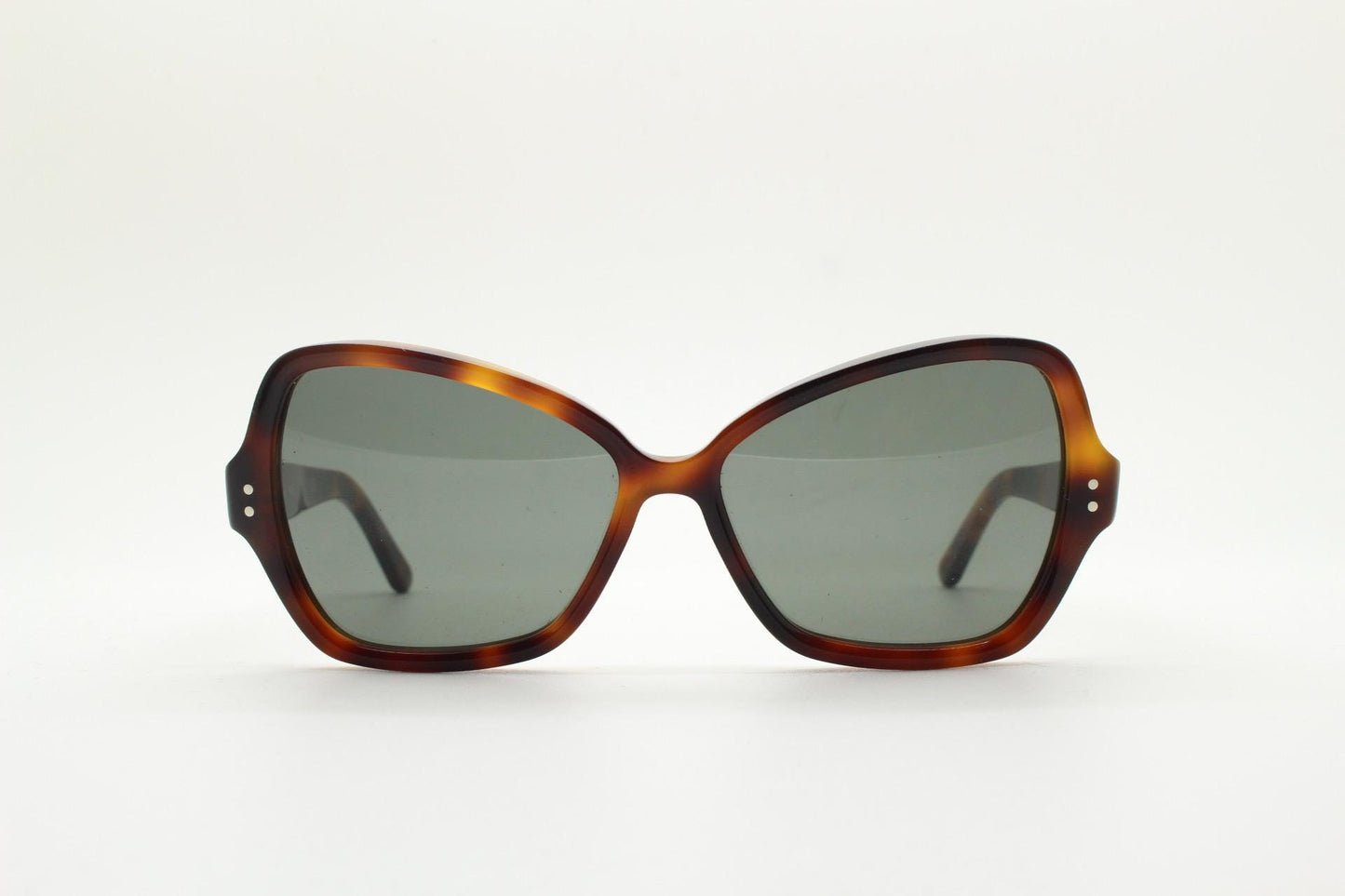 Celine Paris vintage angular cat eye sunglasses made in Italy. Tortoise butterfly frame in good proportions with green lenses. Womens Y2K