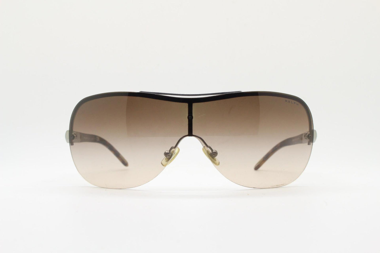 Ralph by Ralph Lauren Y2K vintage big shield sunglasses. 2000's curved wraparound mini mask with graduating mono lens. Aviator