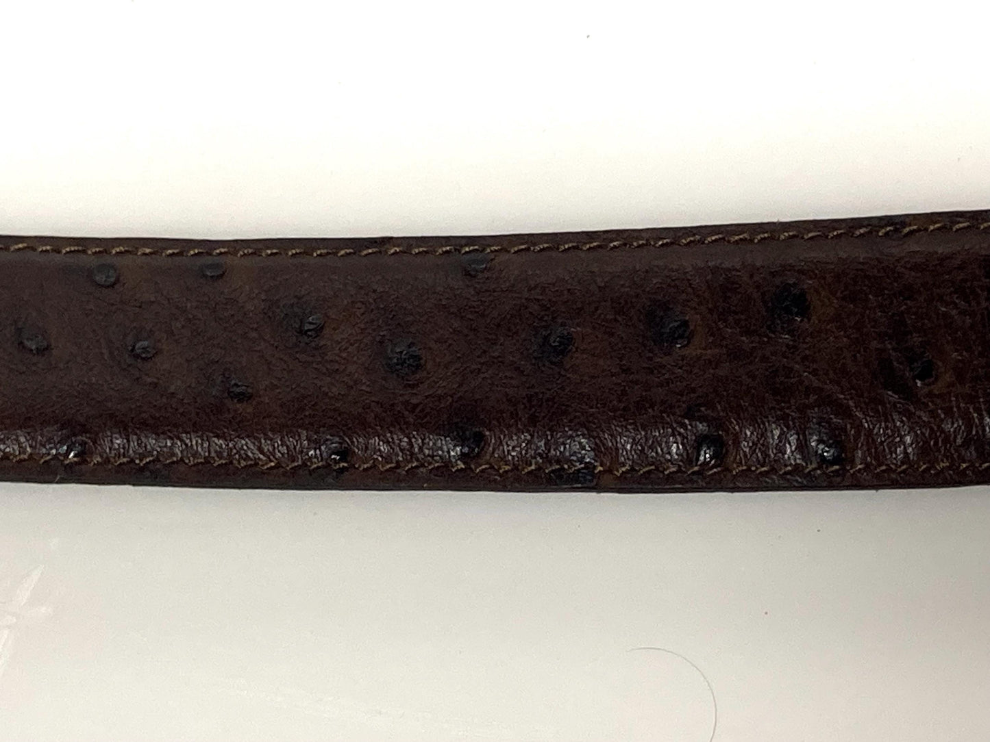 90s vintage dark brown genuine leather belt made in Italy by Joseph Di Pino. Tooled finish made to look like Ostrich. NOS. Mens Large