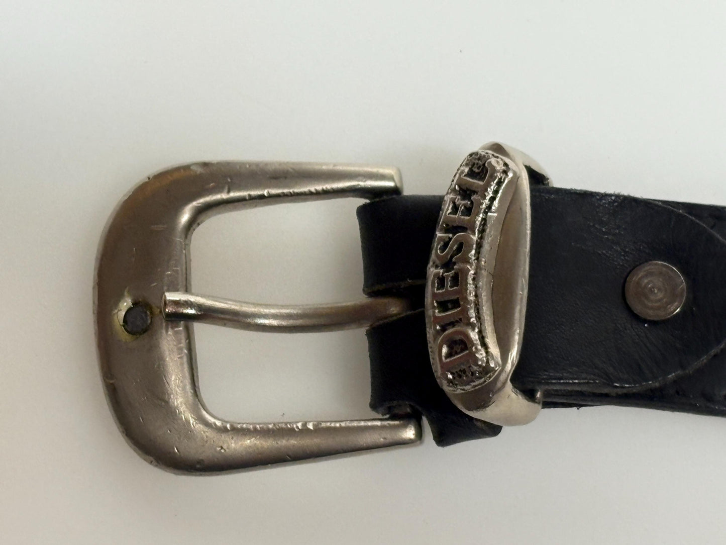 Diesel 90s vintage thick black genuine leather belt for jeans. Superior quality with silver buckle and simple script logo. Textured cowhide