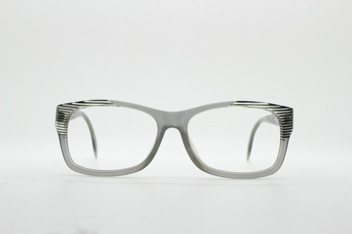 Alain Mikli rectangular eye glasses made in France. Dynamic black and white striped layered acetate grey optical frame. Prescription RX