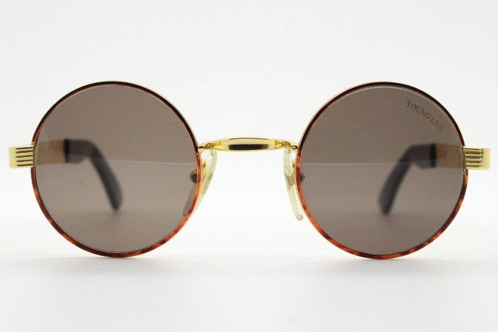 Optical City 90s vintage small round undersized sunglasses made in Italy. Handsome metallic tiger pattern on quality 1920s repro frame. NOS