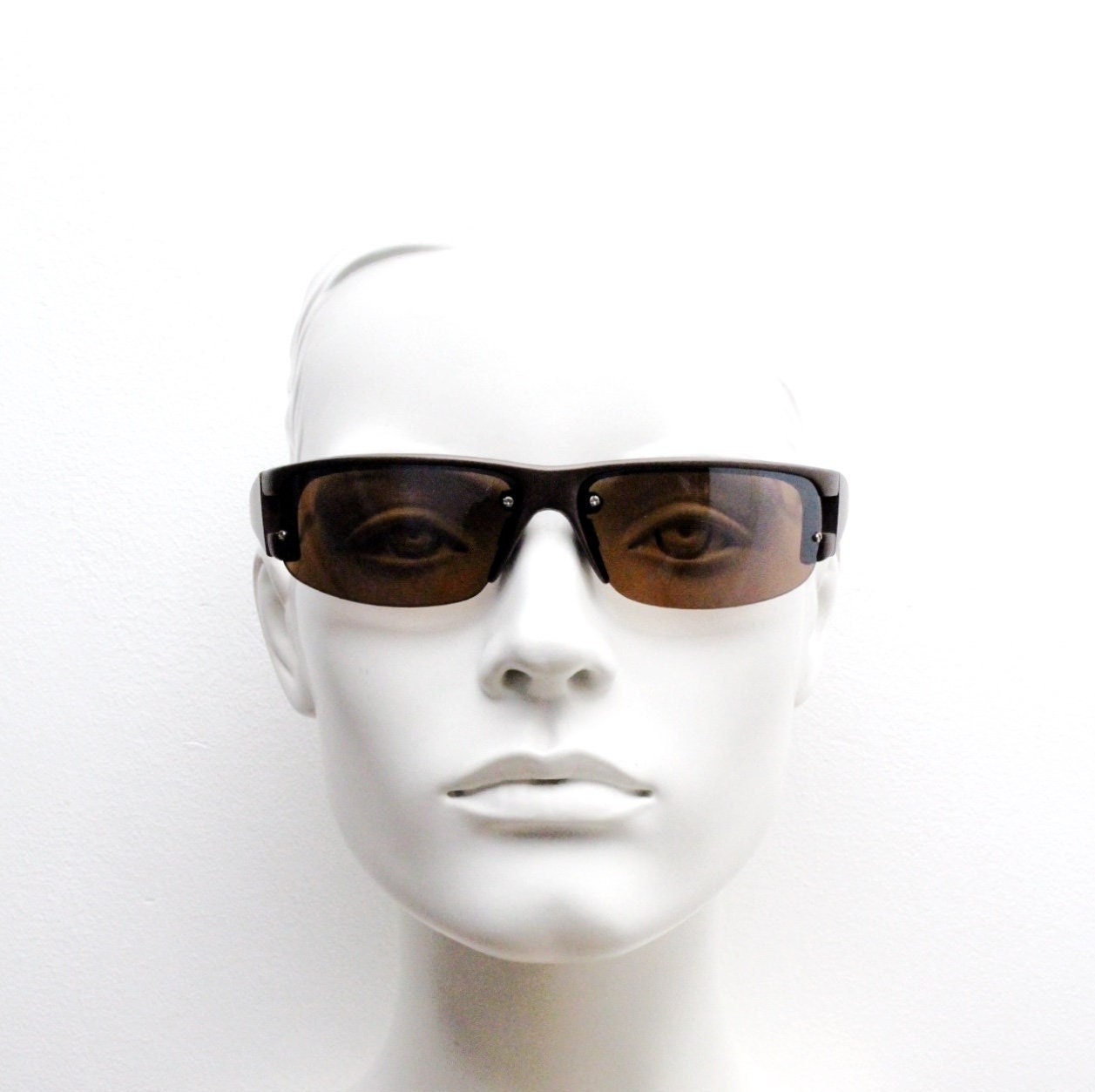 90s vintage visor sunglasses. Brown matt half frame wrap around sports shield with light tone lenses. Mini mask. 2000's. Y2K NOS