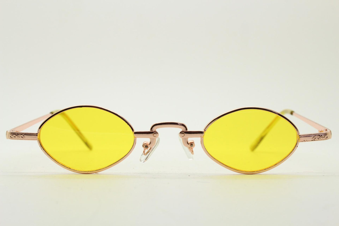 90s vintage small oval sunglasses. Imposing minimal rose gold metal victorian style frame with yellow lenses. Steampunk. BNWT
