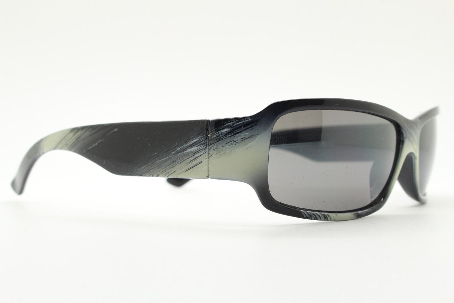 Y2k vintage wrap around rectangular sunglasses. Low profile curved white and black gloss frame with grey lenses. 2000's bug eye. NOS