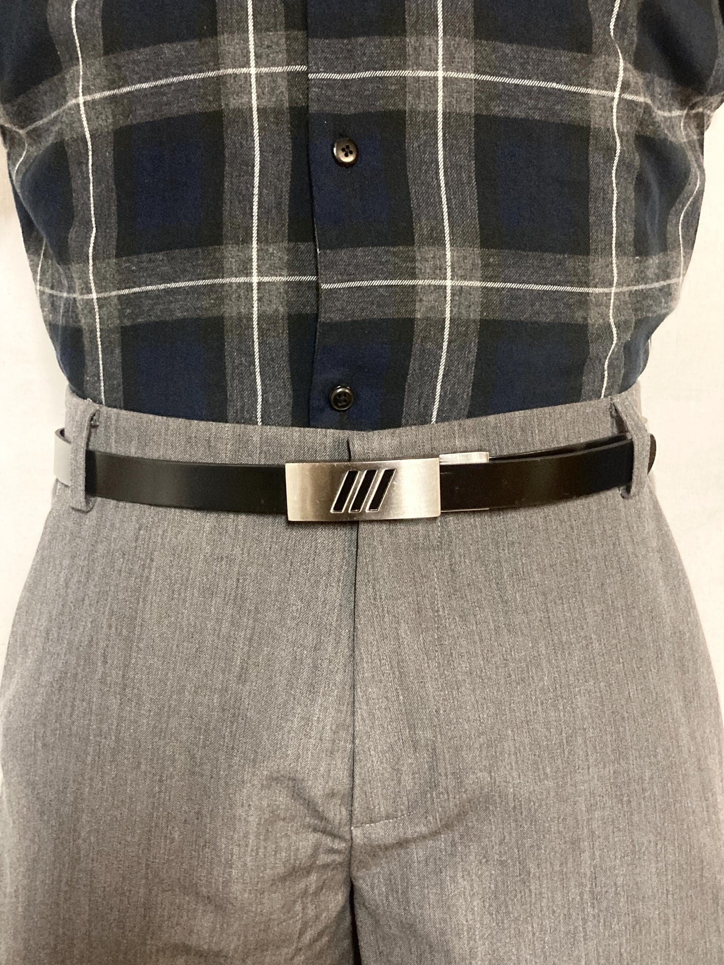 90s vintage smart trouser belt. Thick eco vinyl in black shiny finish with steel buckle with cutouts. Seamless no holes design. Mens NOS