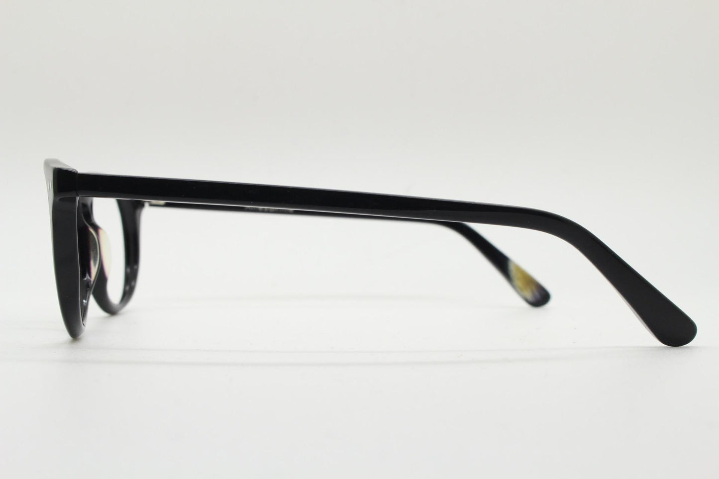 90s vintage oval eye glasses by Alles Brille of Germany. Classical black gloss acetate optical frames with keyhole bridge. RX Spectacles