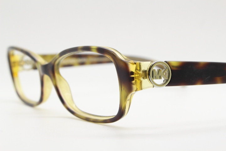 Michael Kors vintage rectangular eye glasses. Tortoise layered acetate low profile cateye optical frame. Womens prescription spectacles