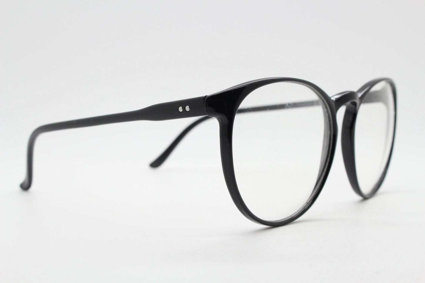 80s vintage black round glasses. Slightly oversized slim optical frames. Prescription eyeglasses with clear lens. RX spectacles