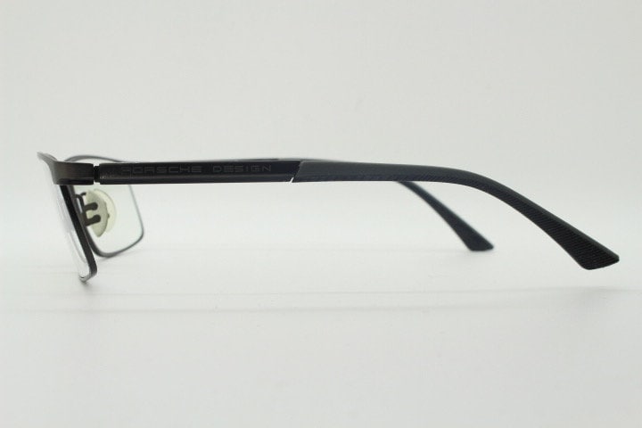 Porsche design rectangular eye glasses model 8251 made in Japan. Minimal gunmetal grey wire optical frame. Prescription RX spectacles