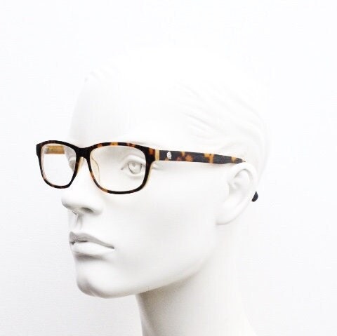 Cheap Monday rectangular low profile eye glasses. Brown and amber layered acetate optical frames. Prescription eyeglasses. RX spectacles