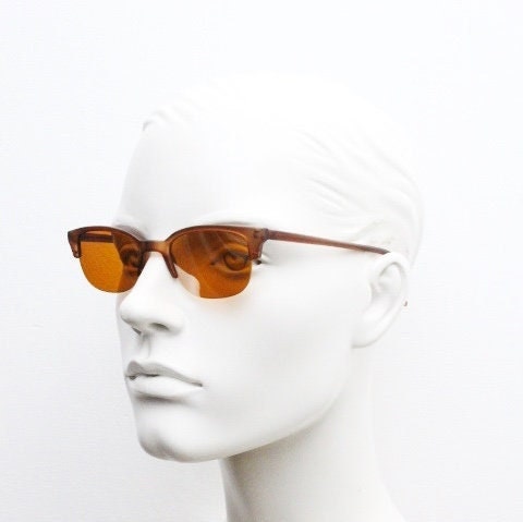 90s vintage low profile cat eye sunglasses. Transparent half frame cateye with matching mirror glazed light tone lenses. NOS