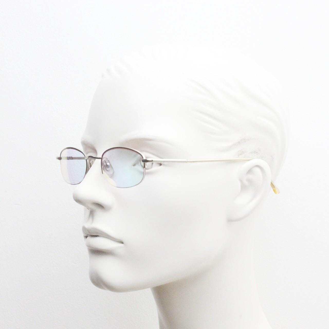 90s vintage small rectangular sunglasses. Silver chrome half frame with light tone lenses with gold mirror glaze. 2000's. Y2K. NOS micro