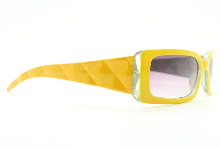 Y2K vintage rectangular shield sunglasses. Low profile canary yellow wrap around frame with quilt effect arms and ombre lenses. NOS. 2000s