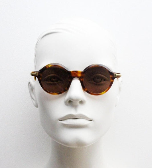Samco 90s vintage round sunglasses made in Italy. Classical small sized 30s design in honey tortoise frame with protruding sides. NOS