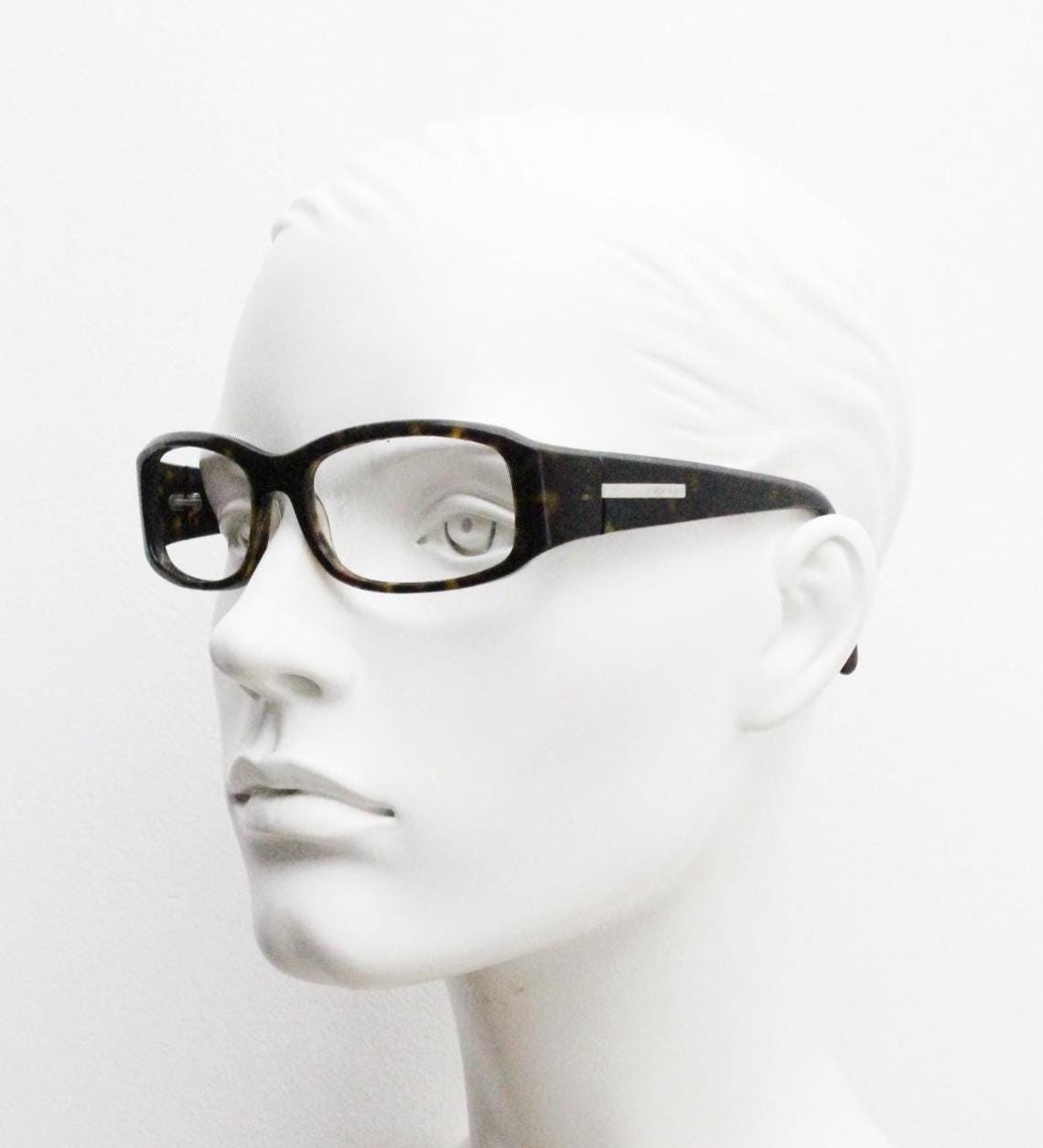 Prada rectangular wrap around eyeglasses made in Italy. Tortoise curving acetate optical frame with tall arms. Vintage prescription glasses
