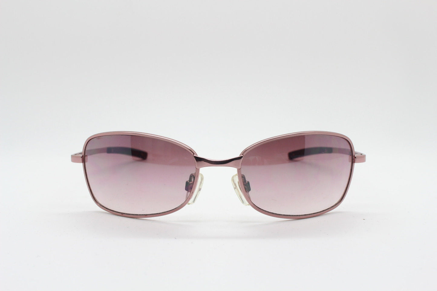 Y2K vintage curved sunglasses. Unusual Pink chrome metal frame with matching flared rectangular lenses. Unused 2000s NOS