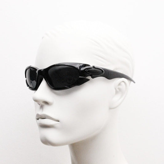 90s vintage sports shield sunglasses. All black gloss aerodynamic wraparound with many stylised features. 2000's. Hells angel uber fashion