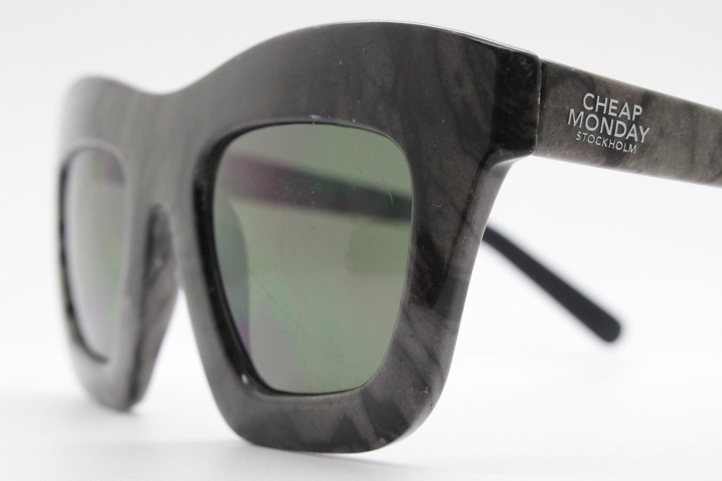 Cheap Monday thick frame cateye sunglasses. Womens chunky oversized grey and black marble cat eye with dark green lenses. Y2k vintage