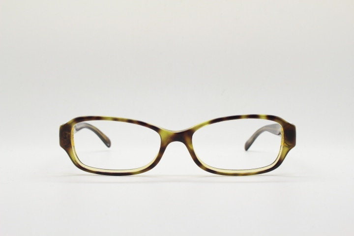 Michael Kors vintage rectangular eye glasses. Tortoise layered acetate low profile cateye optical frame. Womens prescription spectacles