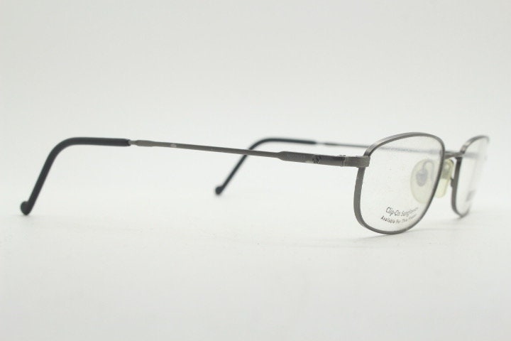 Moschino 90s vintage glasses model 3066 made in Italy. Small low profile rectangular optical frames. Prescription eyeglasses. RX. NOS