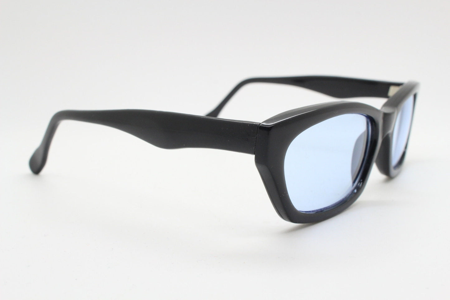 80s vintage rectangular sunglasses. Low profile 60s design black gloss frame with extra light tone sky blue lenses. BNWT Unused NOS