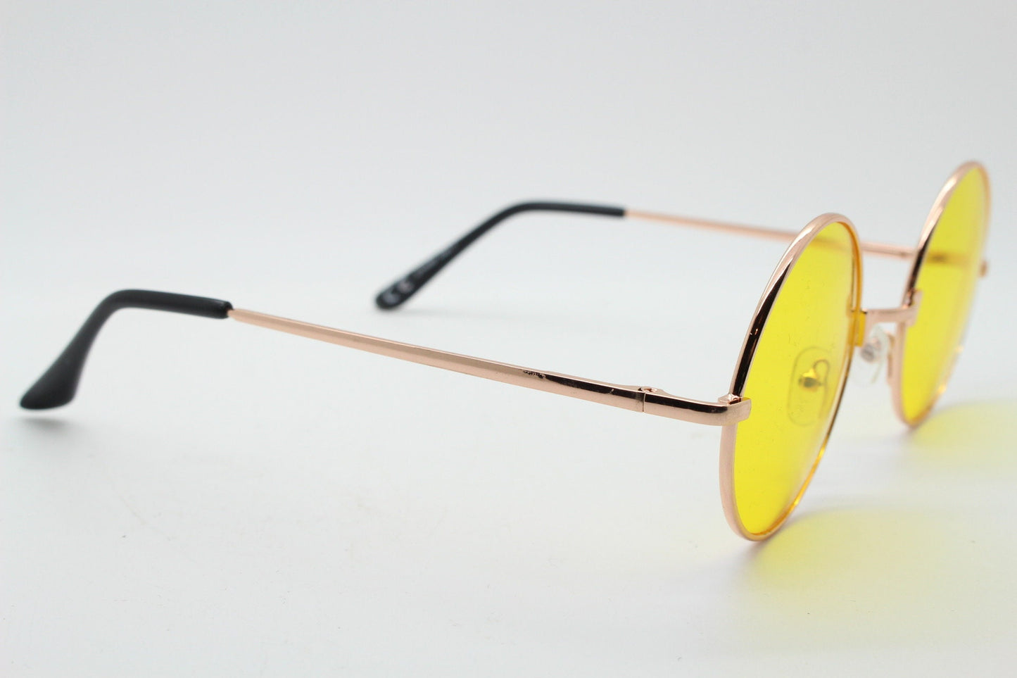 90s round vintage sunglasses. Rose gold metal frame with bright yellow lenses. 1920's style. John Lennon. Steampunk. NOS
