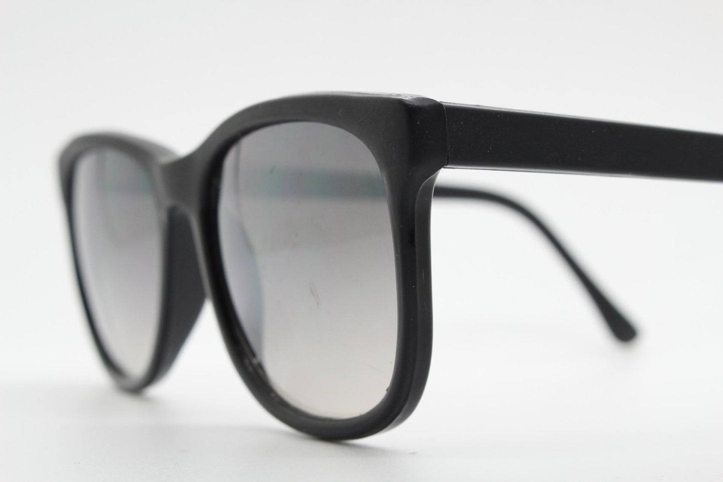 Vintage 80s thick frame black square sunglasses. All time classic design in matt and gloss combo with slight mirror glaze lenses. NOS