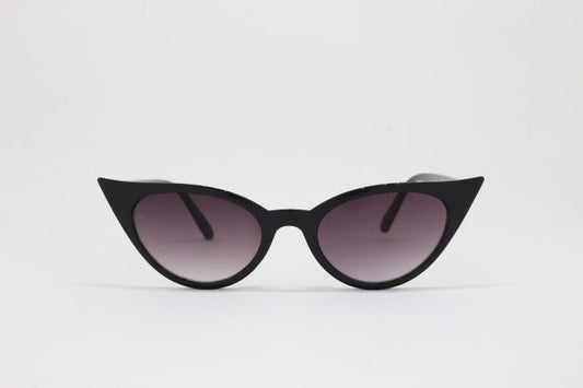 Y2K vintage pointed cat eye sunglasses. Black slender frame with graduated lenses. Womens 50s style rockabilly, pin up shades