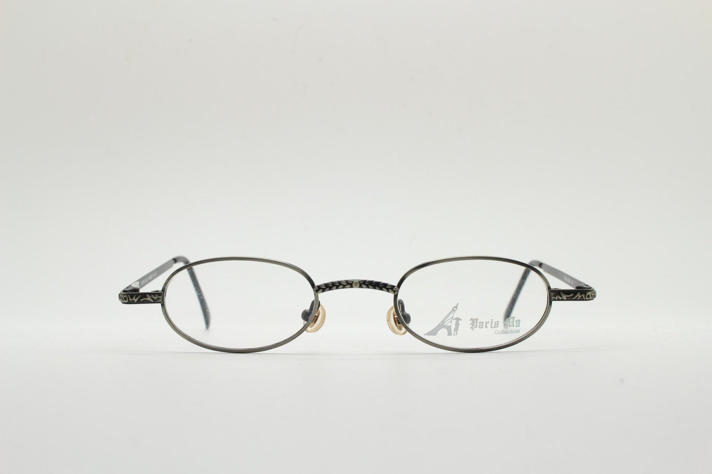 Paris Ma 90s vintage small oval eye glasses. Brushed bronze finish optical frames with ornate details. Prescription steampunk spectacles NOS