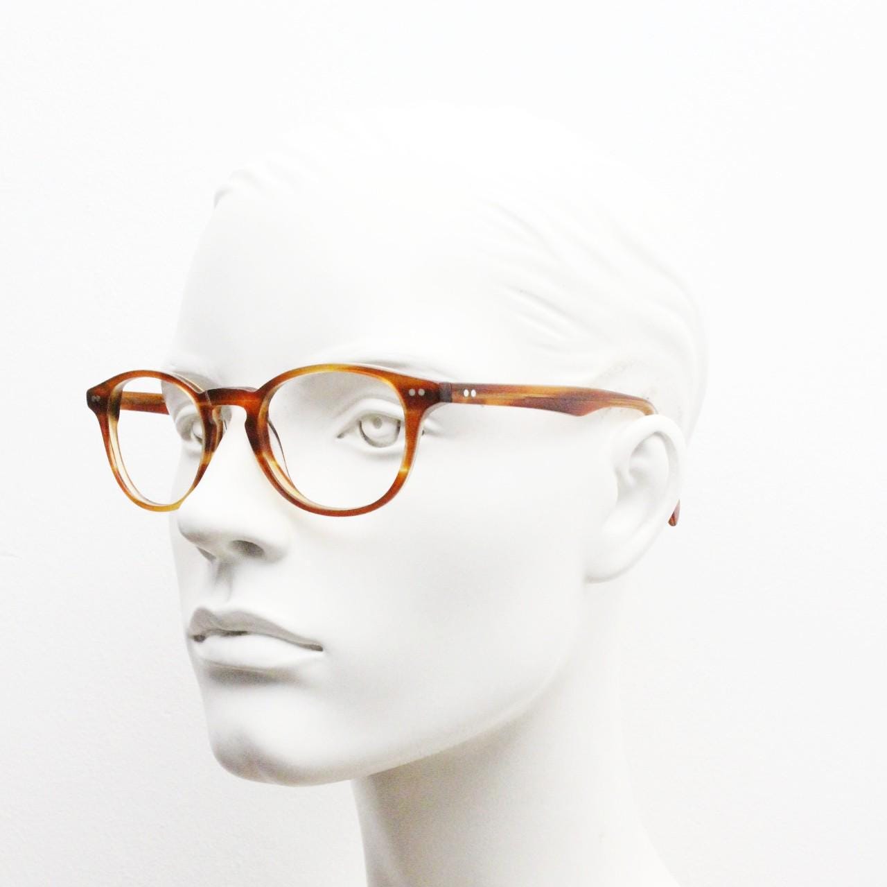Rectangular vintage eye glasses. Minimal classic design optical frames in tortoise acetate with keyhole bridge. Prescription RX spectacles