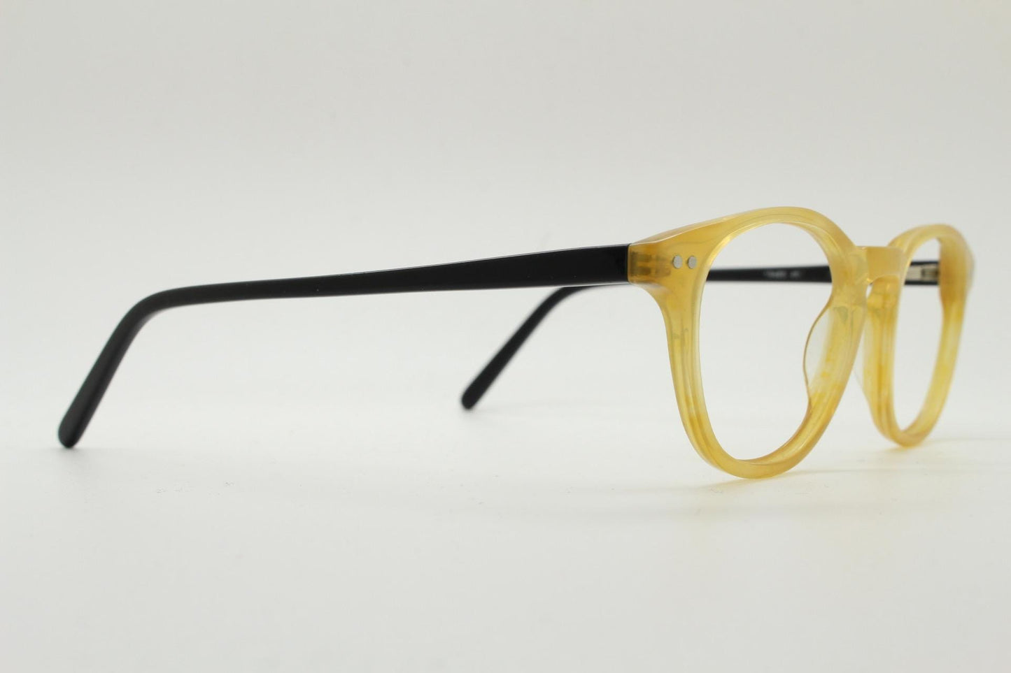Entrostyle vintage round 40s design eye glasses. Beeswax coloured acetate optical frame with keyhole bridge and black arms. Prescription RX