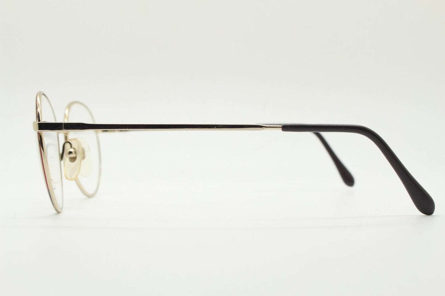Marcolin 90s vintage round metal eye glasses made in Italy. Panto shape optical frames with attractive red and black front. Prescription RX