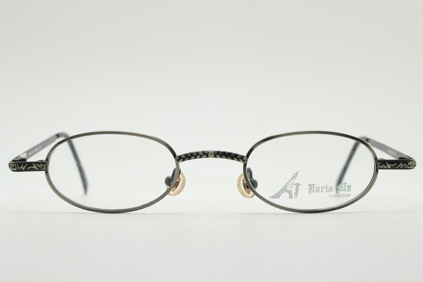 Paris Ma 90s vintage small oval eye glasses. Brushed bronze finish optical frames with ornate details. Prescription steampunk spectacles NOS