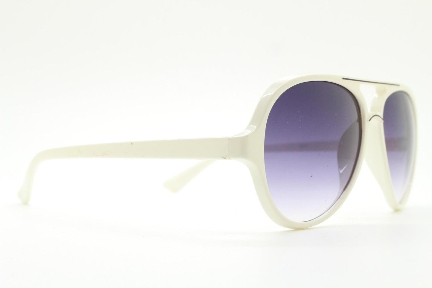 Y2K vintage teardrop aviator sunglasses. 2000's ice white frame with graduating black lenses and bridge outline. 80s design NOS aviators