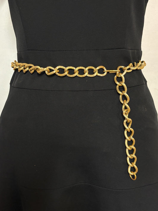 60s vintage womens decorative thick chain belt. Gold shiny metal with textured surface that covers a wide size range. Festival. Hippy. NOS