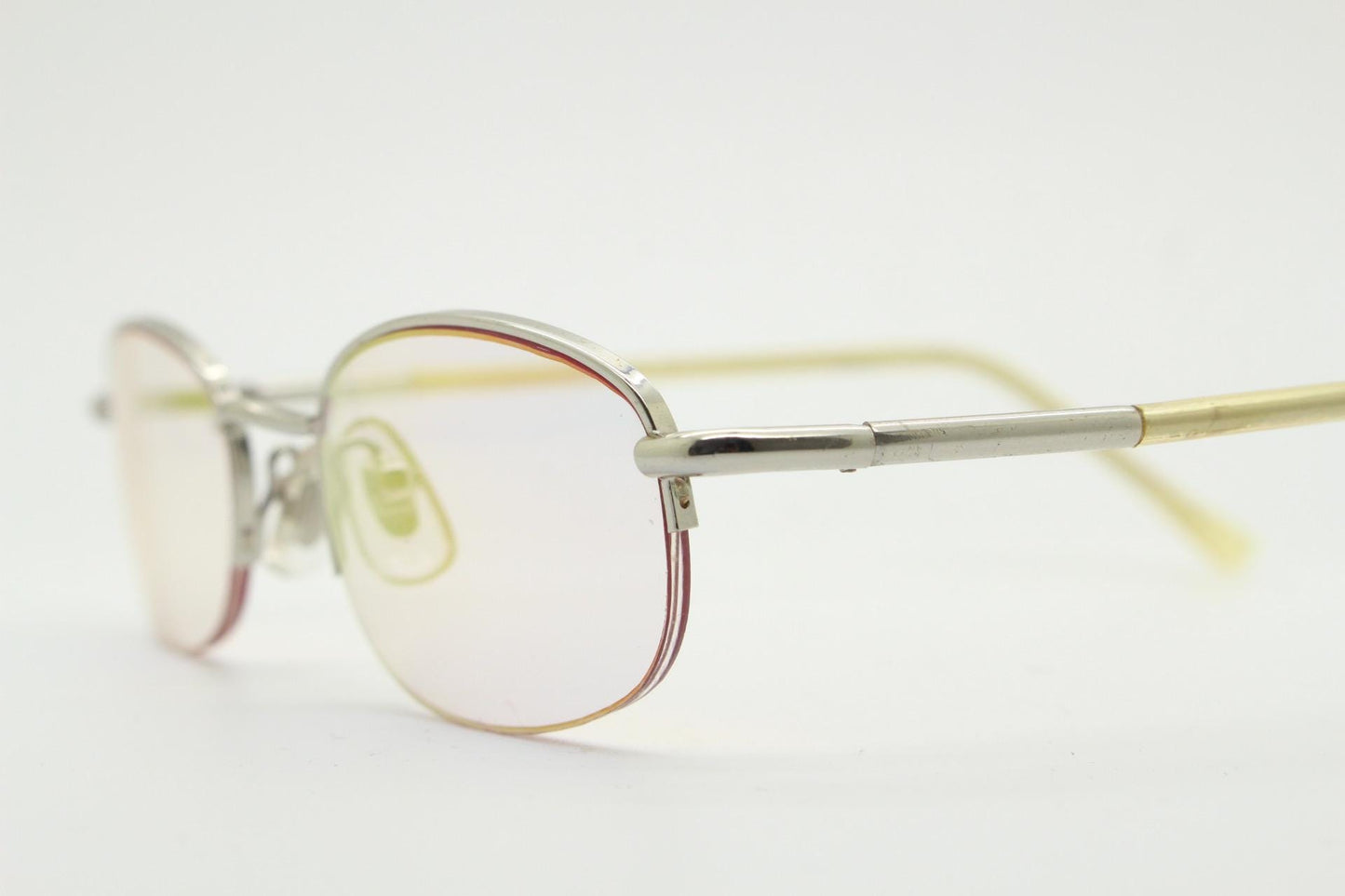 90s vintage small rectangular sunglasses. Silver chrome half frame with light tone lenses with gold mirror glaze. 2000's. Y2K. NOS micro